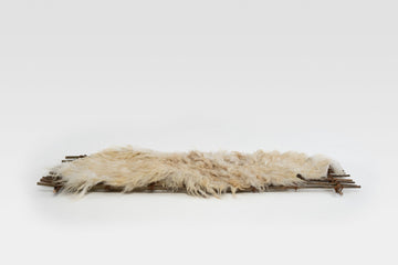 Schapenvacht matras voor uitvaart