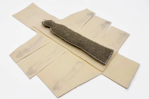 De Omhelzing miniatuur