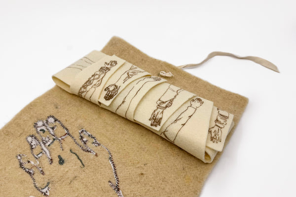 De Omhelzing miniatuur